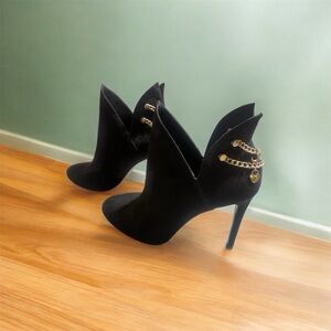 BCBGeneration Black Heeled Boots with Gold Chain